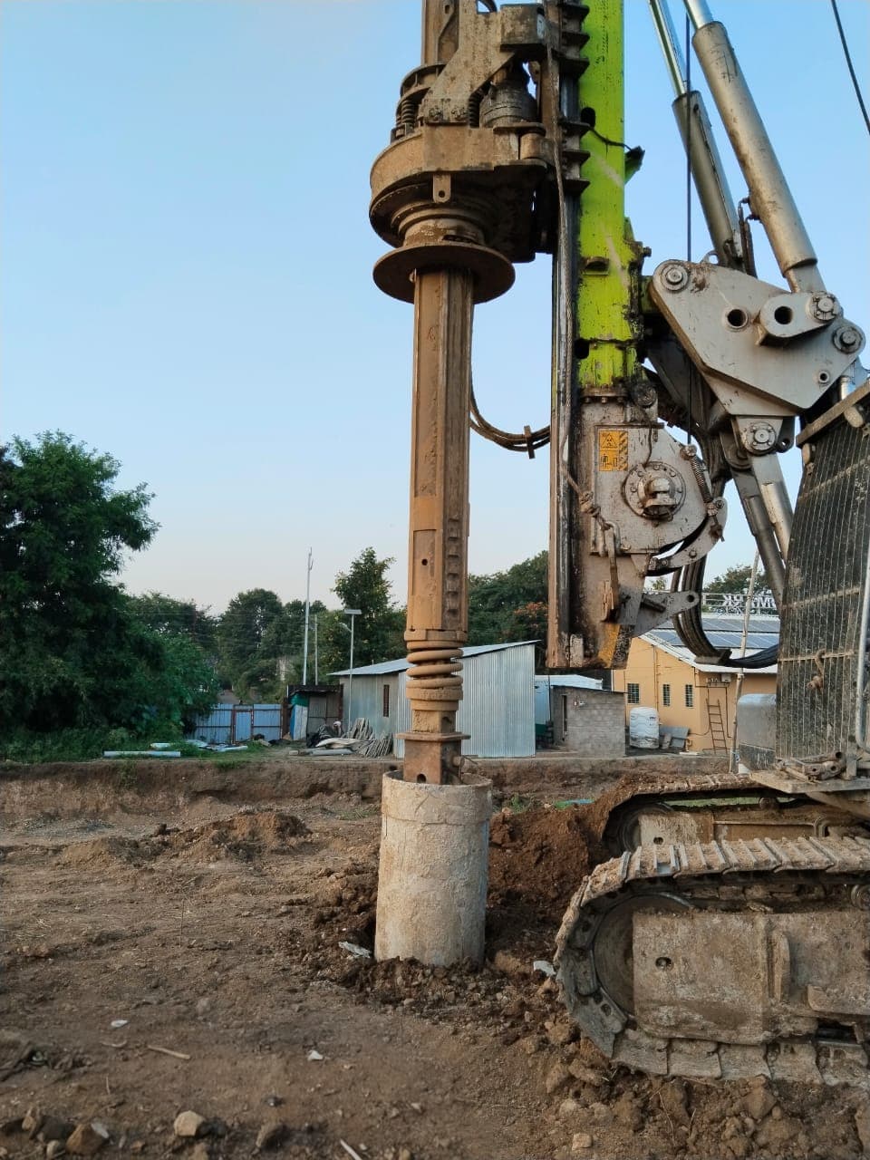 Hydraulic piling rig on a construction site